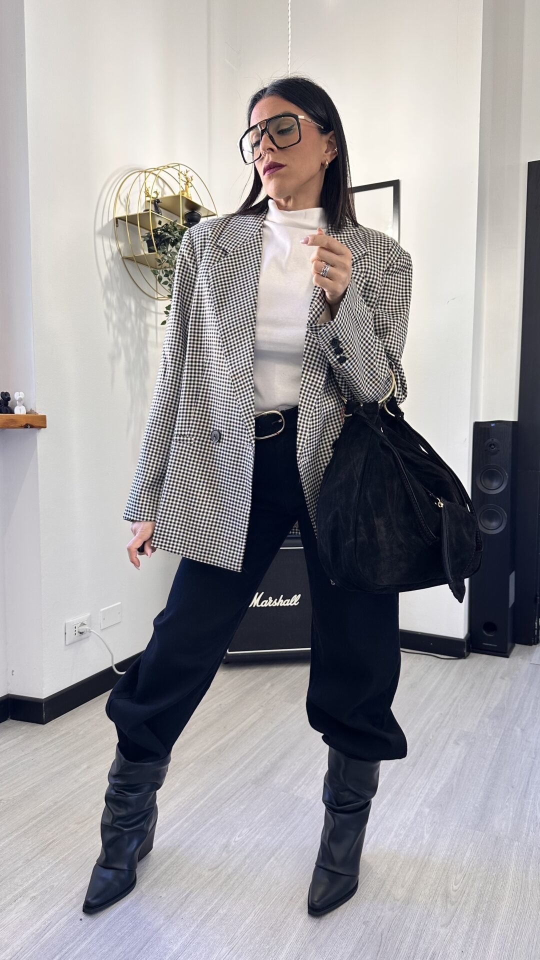OUTFIT DELLA MADONNA